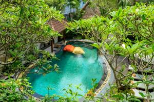 Majoituspaikassa Lumbung Sari Ubud Hotel - CHSE Certified tai sen lähellä sijaitseva uima-allas