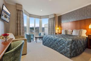 A bed or beds in a room at Ambleside Salutation Hotel & Spa, World Hotel Distinctive