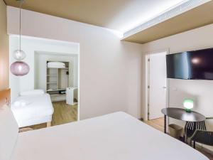 Vuode tai vuoteita majoituspaikassa Ibis Styles Lisboa Centro Marquês de Pombal