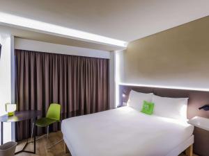 Vuode tai vuoteita majoituspaikassa Ibis Styles Lisboa Centro Marquês de Pombal