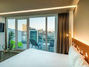 Vuode tai vuoteita majoituspaikassa Ibis Styles Lisboa Centro Marquês de Pombal