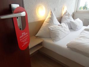 Krevet ili kreveti u jedinici u objektu Hotel Linnert