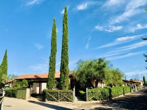 Градина пред Casa in Maremma Tuscany Village