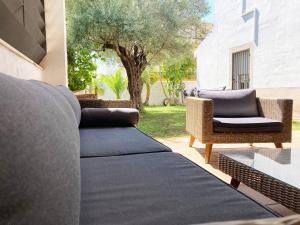 Zona d'estar a Casa ChillOut a 6km de Sevilla Piscina comunitaria