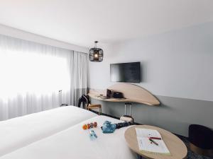 TV i/ili multimedijalni sistem u objektu ibis Styles Nancy Laxou