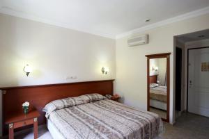 Tempat tidur dalam kamar di Yel Holiday Resort