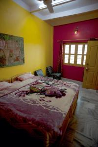 Krevet ili kreveti u jedinici u okviru objekta Ganpati Guest House