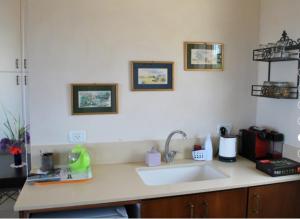 A kitchen or kitchenette at מול הכנרת Over looking the Sea of Galilee