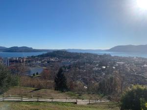 a view of a city and a body of water at Sole in Verbania