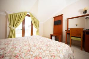 Tempat tidur dalam kamar di Yel Holiday Resort