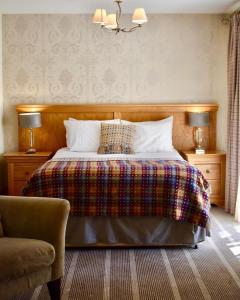 A bed or beds in a room at The Coledale Inn