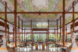 a rendering of the lobby of a resort with a painting on the ceiling at Meliá Bali in Nusa Dua