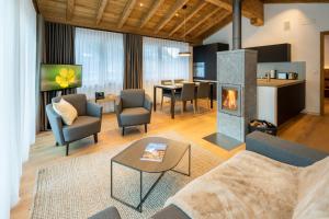 โทรทัศน์และ/หรือระบบความบันเทิงของ Luxury Residence Colosseo Zermatt