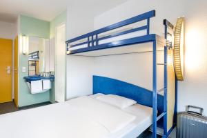 ibis budget Amboise 객실 침대