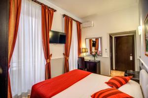 Hotel Everest Inn Rome में एक कमरे में एक या कई बेड