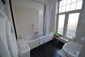 Fraai appartement direct aan zee op toplocatie. 욕실