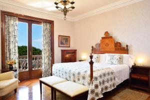 Cama ou camas em um quarto em Hostal de la Gavina GL - The Leading Hotels of the World