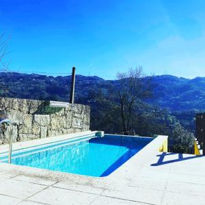 The swimming pool at or close to Gerês Country Stays - Lagar