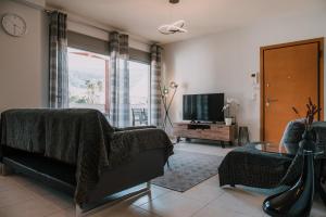 Televizors / izklaižu centrs naktsmītnē Nafplio Pleasure Stay II