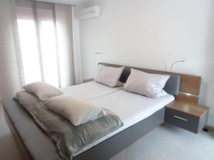 Tempat tidur dalam kamar di Apartment Brake by Interhome