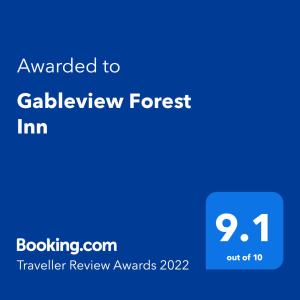 En logo, et sertifikat eller et firmaskilt på Gableview Forest Inn ゲーブルビュー