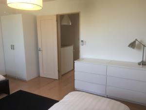 Säng eller sängar i ett rum på Nasu Townhouse N-3