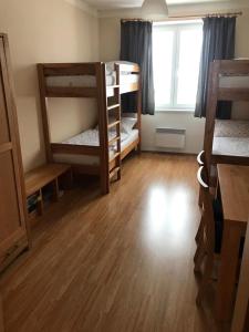 Una cama o camas en una habitación de Apartmán Abertamy