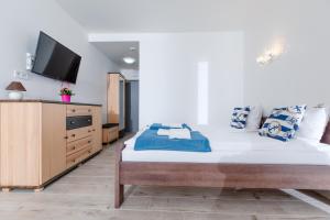 Ένα ή περισσότερα κρεβάτια σε δωμάτιο στο Apartament "Chamesz" Dziwnówek