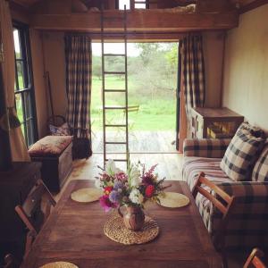 A seating area at Sky View Shepherd's Huts with Woodburning Hot Tub