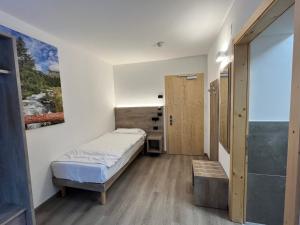 Cama ou camas em um quarto em Hotel Zanella