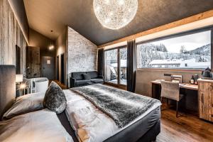 מיטה או מיטות בחדר ב-ALMMONTE SENSUM SUITES Boutique Hotel