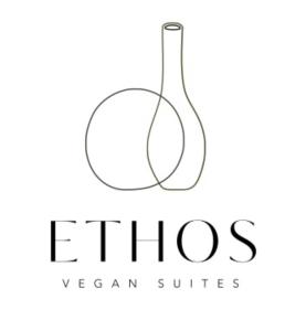 un logo con una bottiglia di vino di Ethos Vegan Suites a Firà