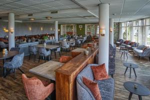 Un restaurant u otro lugar para comer en Landgoed Hotel Tatenhove Texel