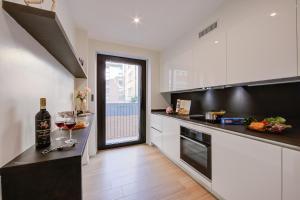 Una cocina o kitchenette en Boutique Apartments - Happy Rentals