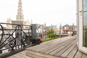 En balkon eller terrasse på Duplex dernier étage avec terasse à deux pas de la grand place