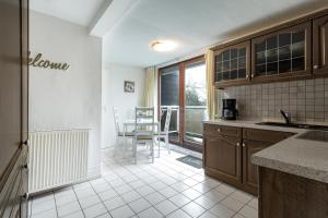 A cozinha ou cozinha compacta de Ferienwohnung-Fuhlsbüttel-Hamburg