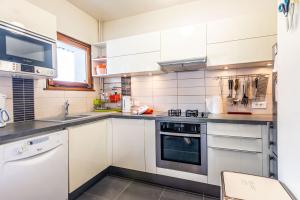 Una cocina o cocineta en Appartement familial - Tout confort - Garage