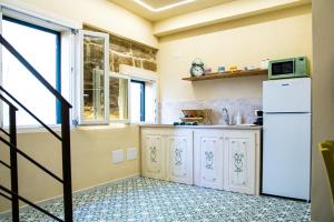 A kitchen or kitchenette at Alguer Relais