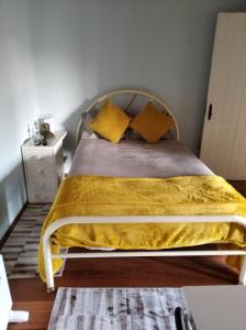 A bed or beds in a room at Quinta dos Campos - Apartamento 2