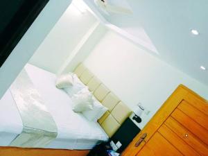 Katil atau katil-katil dalam bilik di White Park Boutique Hotel