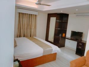 Katil atau katil-katil dalam bilik di White Park Boutique Hotel