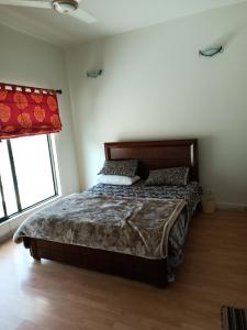 Bhurban 2bed townhouse with a lawn 객실 침대