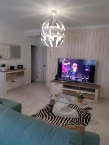 Apartamento Alagoinha TV 또는 엔터테인먼트 센터