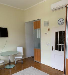 Μια τηλεόραση ή/και κέντρο ψυχαγωγίας στο Apartment 19 Vila Golf Nice Vacation