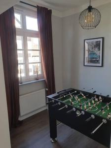 La sala de juegos en Ferienwohnung Leonie