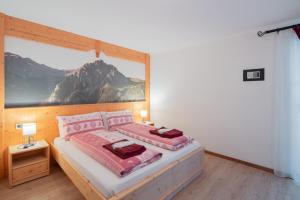 Cama ou camas em um quarto em B&B Agriturismo Cèsa Ciasates