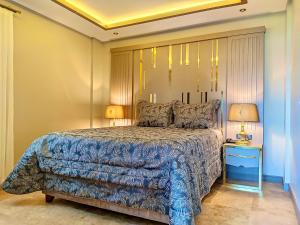 A bed or beds in a room at Roas Hotel Bodrum - City Center