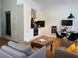 A kitchen or kitchenette at Boennium Apartments