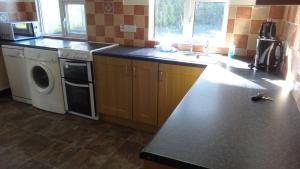 A kitchen or kitchenette at Sligo Wild Atlantic Cottage