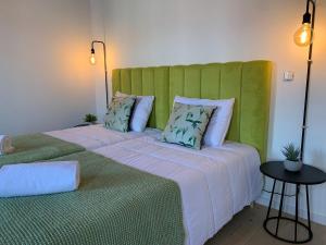 A bed or beds in a room at Lost Inn Porto Hostel